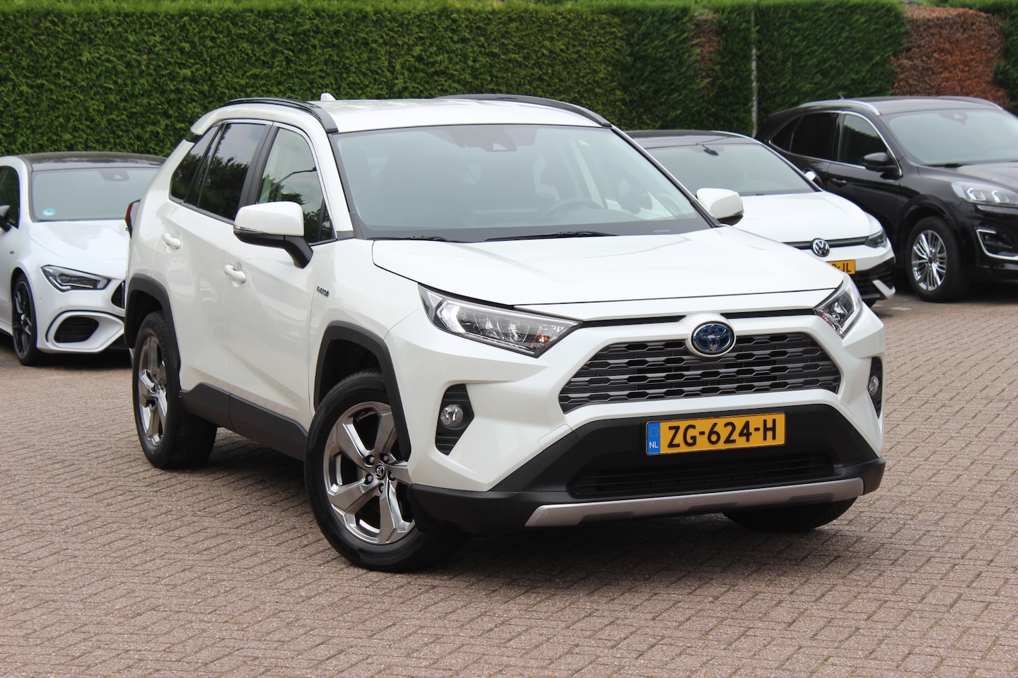 Toyota RAV4 - 2.5 Hybrid Style / Trekhaak / Camera / Leder / Keyless / 18'' / CarPlay / Stoelverwarming - AutoWereld.nl