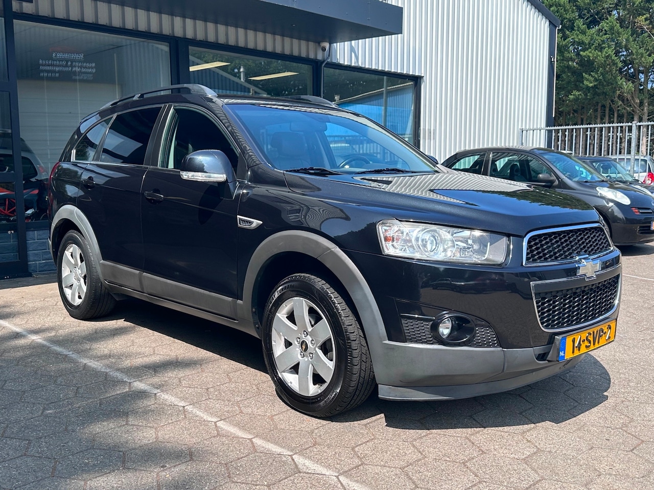 Chevrolet Captiva - 2.4i LT 2WD/Airco/Leder/stof/ 7 personen/ - AutoWereld.nl