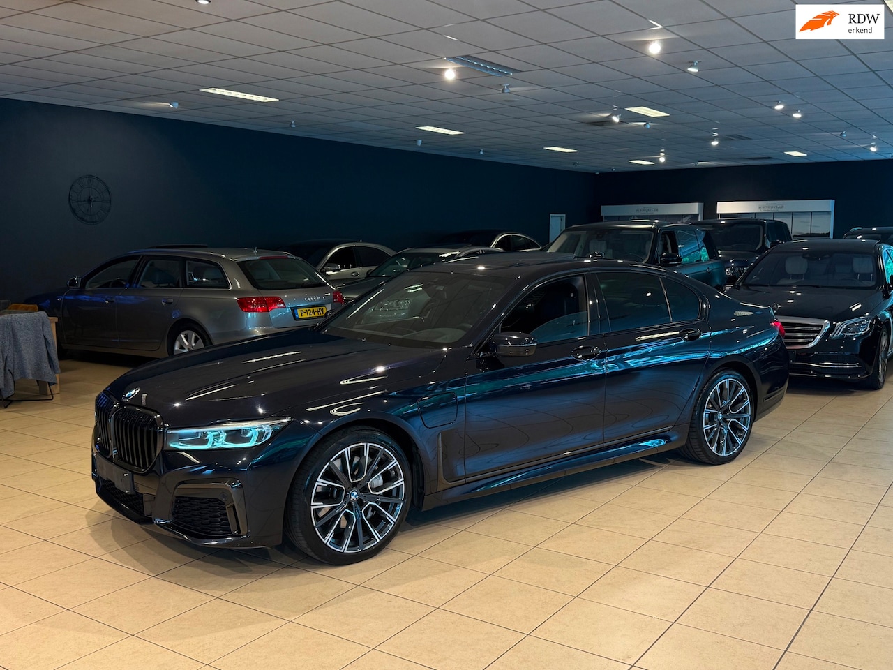 BMW 7-serie - 745e M-Sport/Inclusief BTW/HUD/Schuifdak/360° - AutoWereld.nl