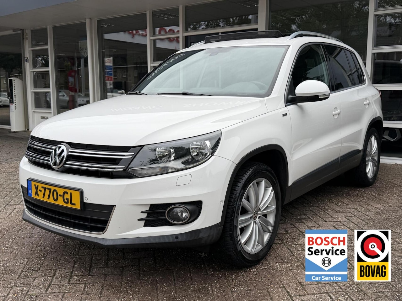 Volkswagen Tiguan - 1.4 TSI Life, Panodak, Navi, Pdc, Trekhaak.. - AutoWereld.nl