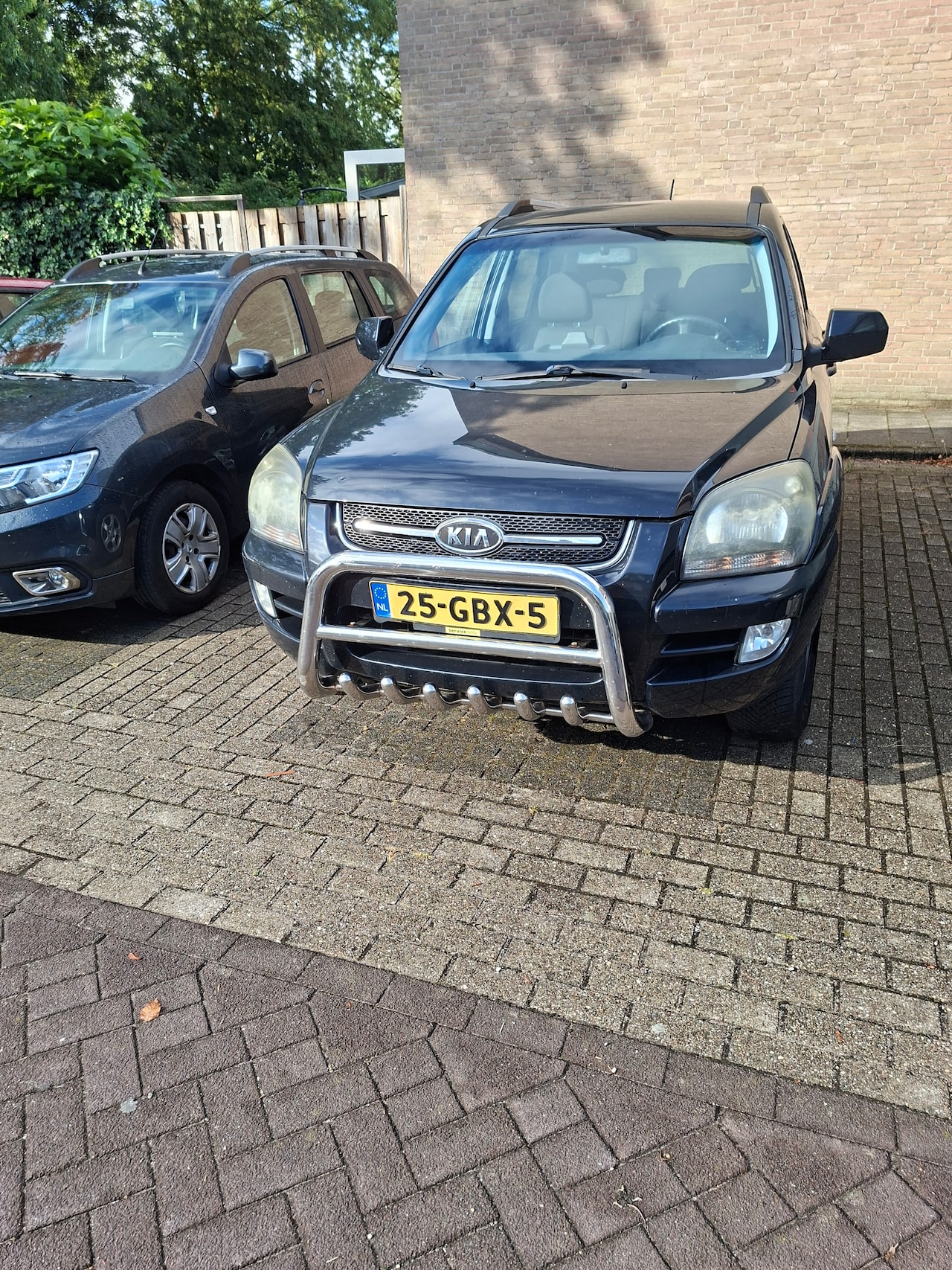 Kia Sportage - 2.0 CVVT Comfort - AutoWereld.nl