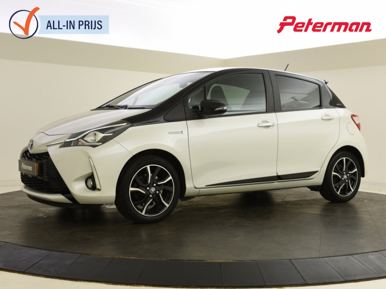 Toyota Yaris - 1.5 Hybrid Bi-Tone | Navigatie | Keyless | Stoelverwarming - AutoWereld.nl