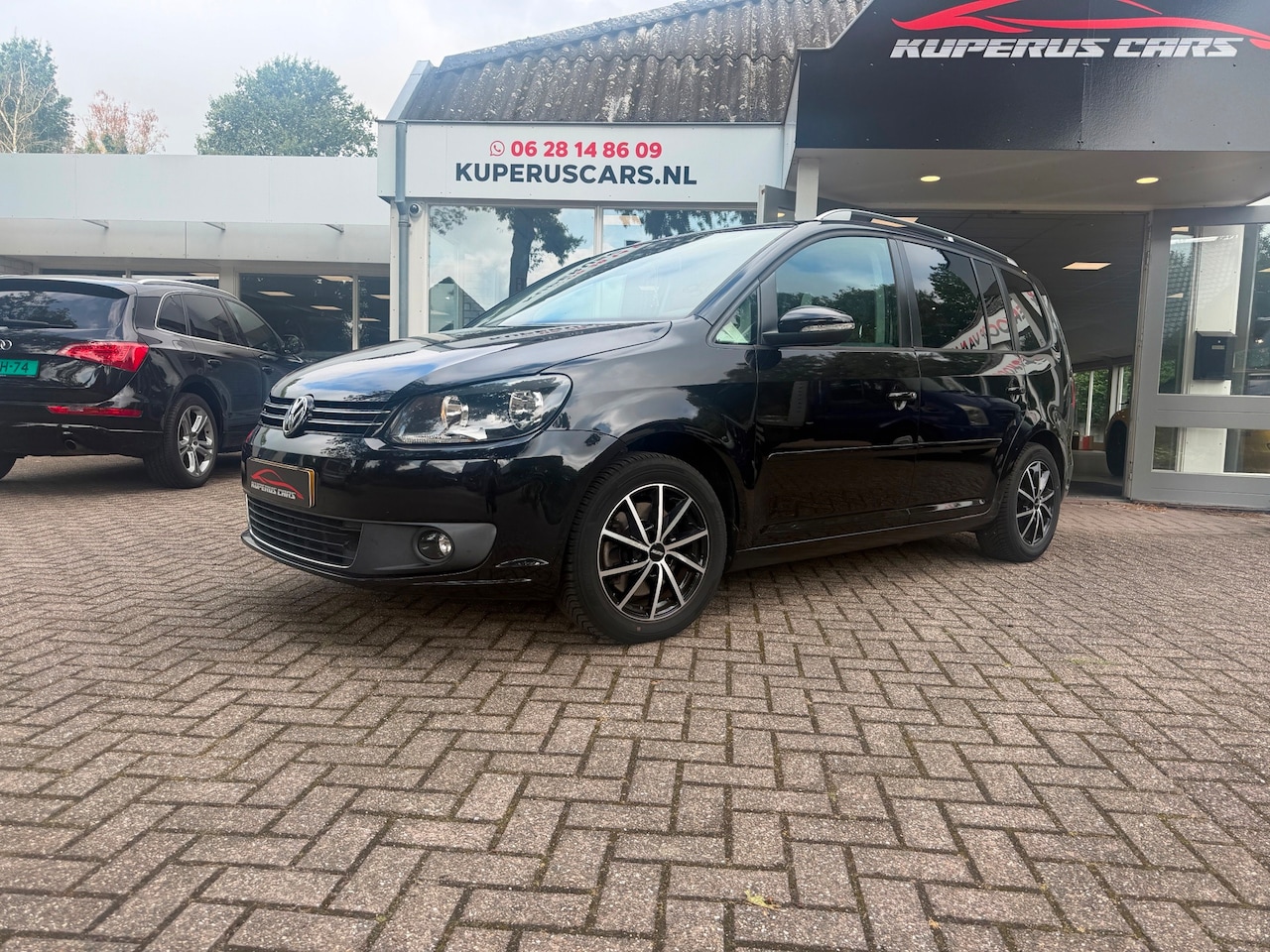 Volkswagen Touran - 2.0 TDI Highline BlueMotion Clima/Cruise/Trekhaak/All season - AutoWereld.nl
