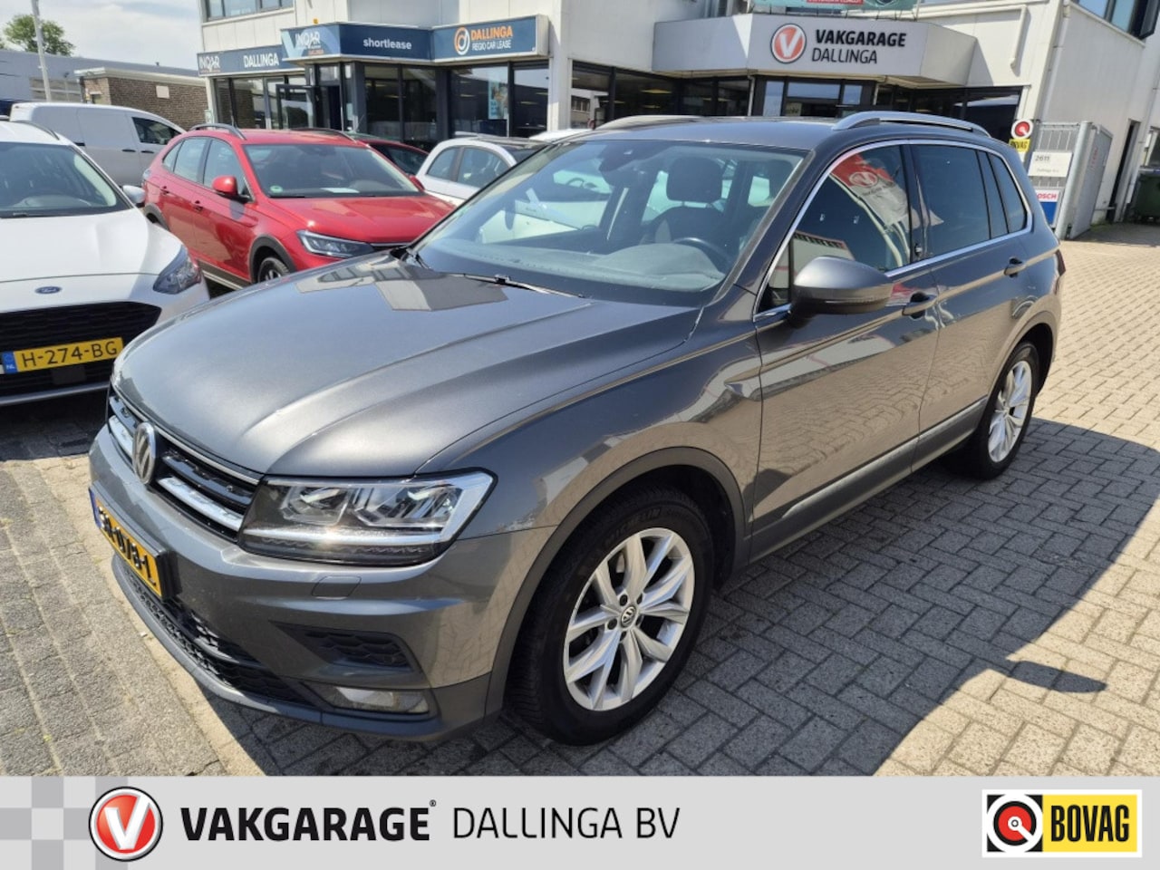 Volkswagen Tiguan - 1.4 TSI ACT SOUND - Elek.TH, Stoelverw, Navi, All season, etc. - AutoWereld.nl