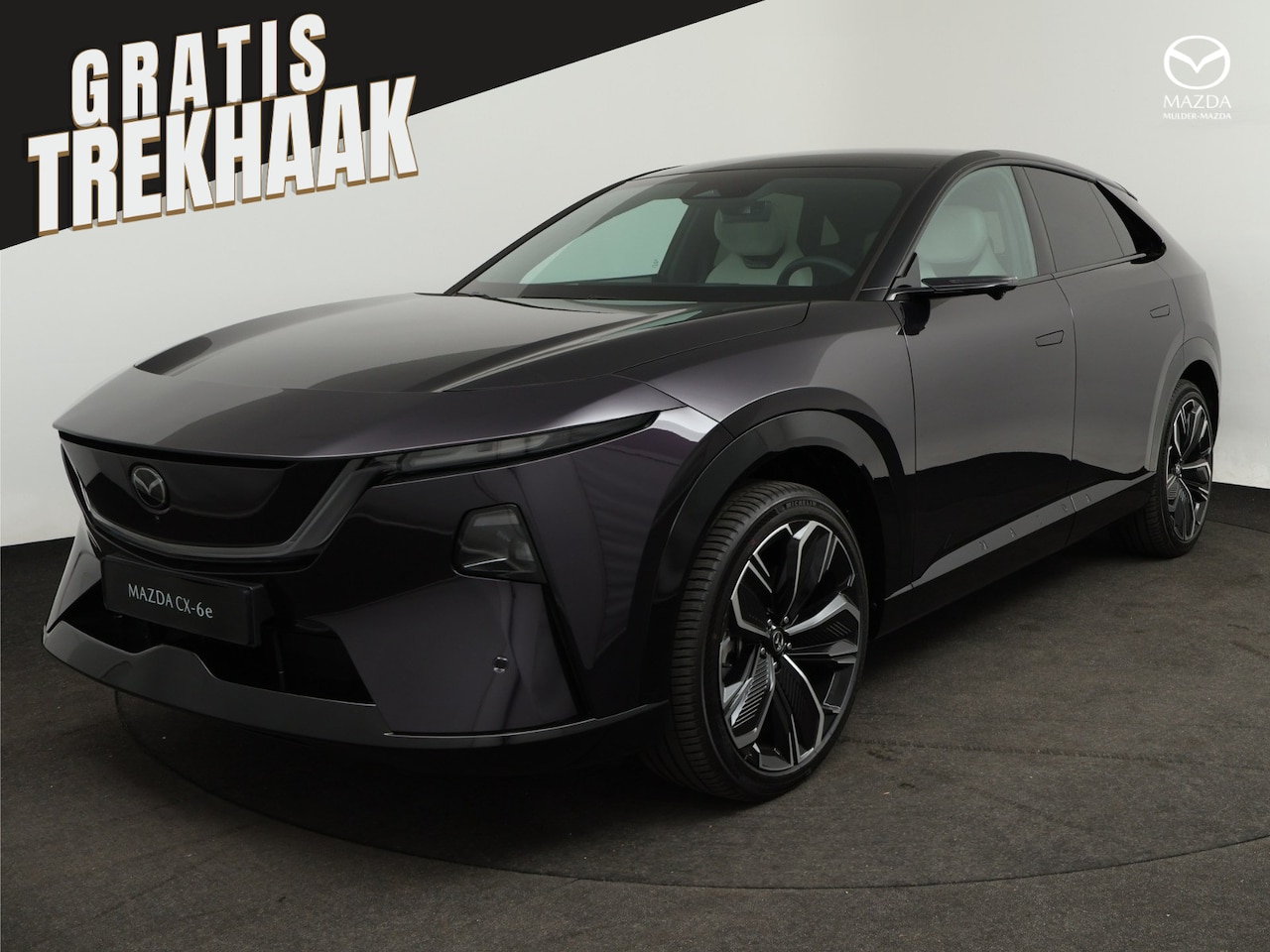 Mazda CX-6e - 78 kWh Takumi Plus | Alarmsysteem | Automatisch dimmende binnenspiegel met randloos design - AutoWereld.nl