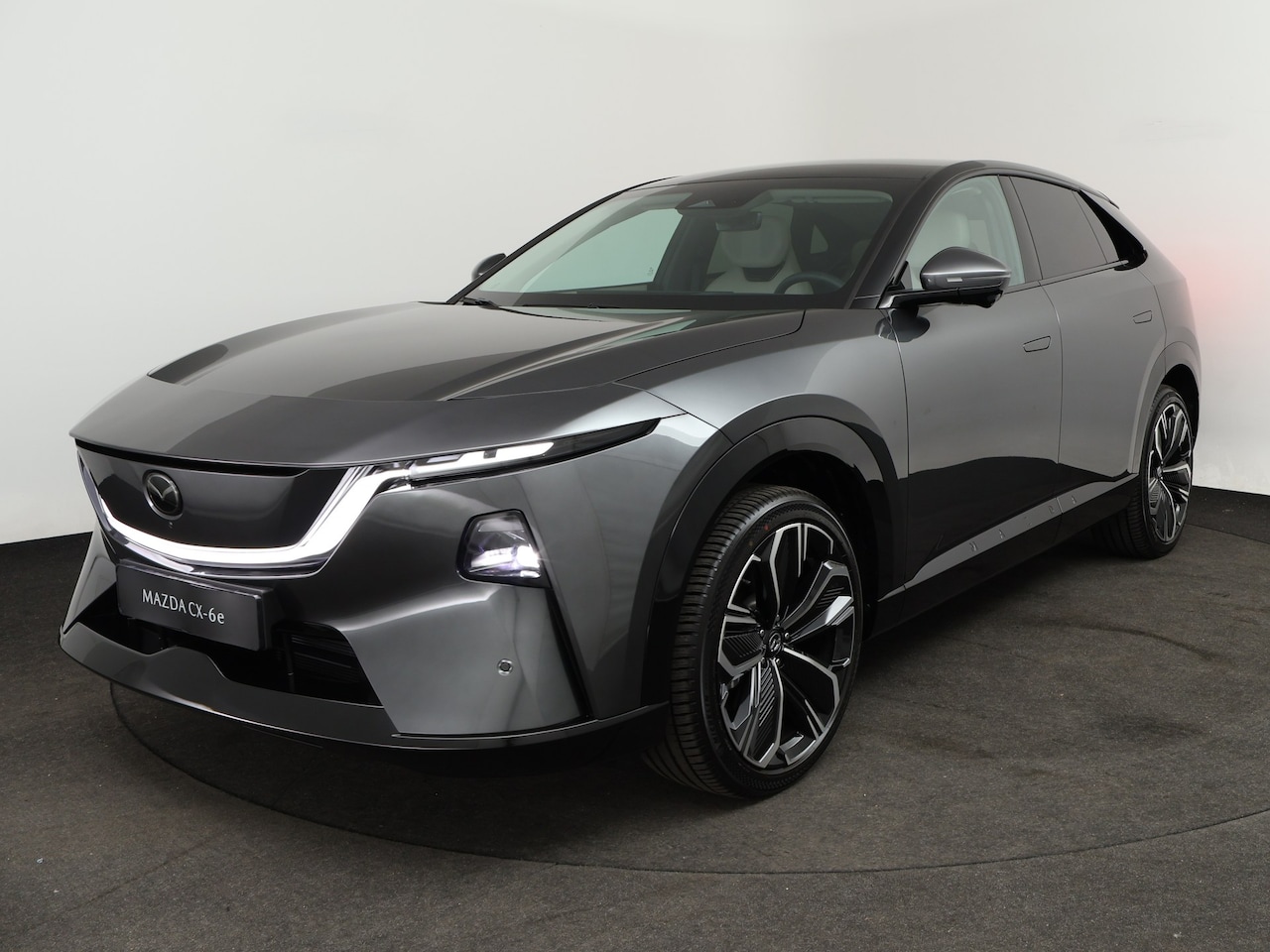 Mazda CX-6e - 78 kWh Takumi | Alarmsysteem | Automatisch dimmende binnenspiegel met randloos design | Dr - AutoWereld.nl