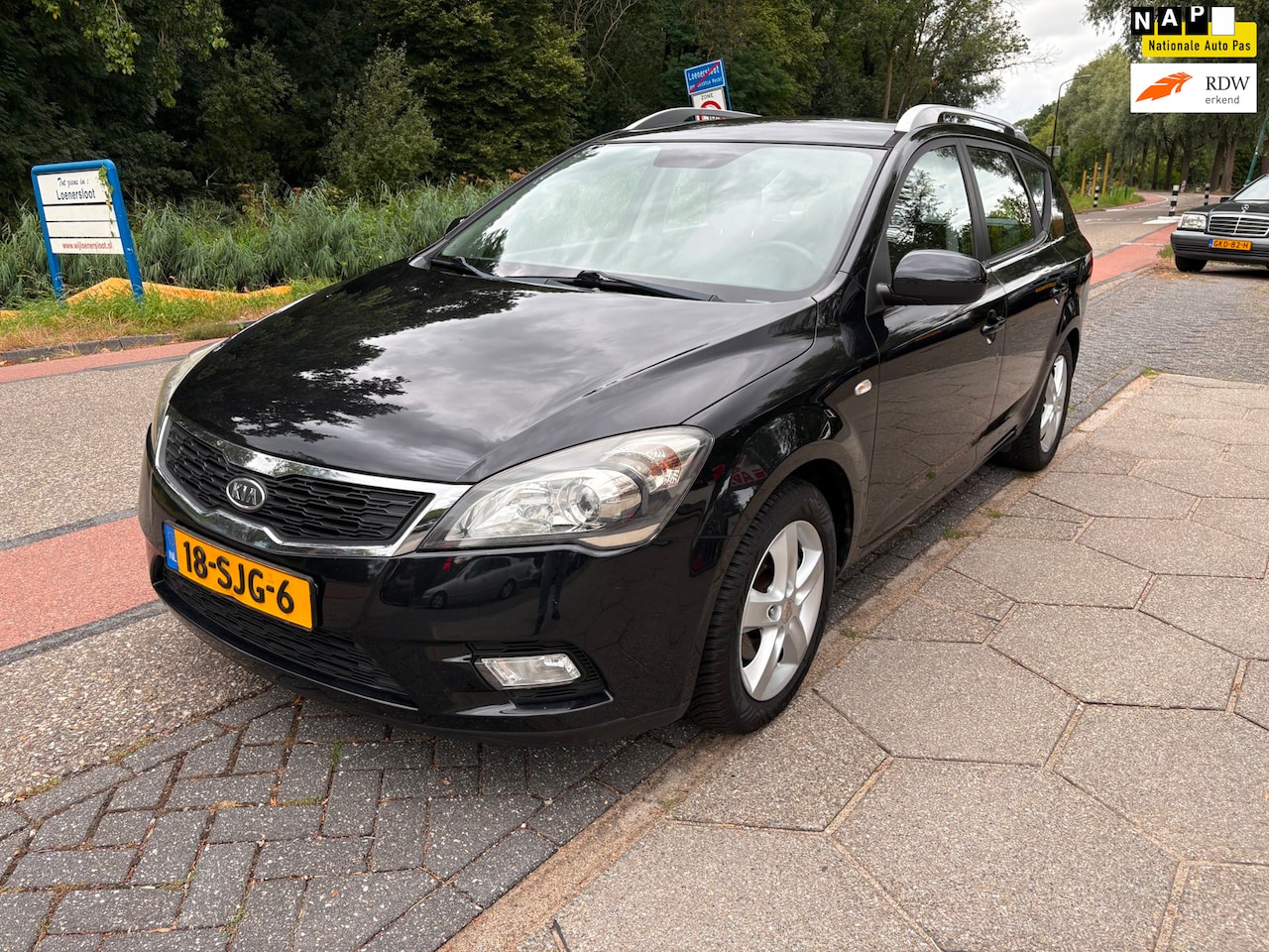 Kia Cee'd Sporty Wagon - 1.4 CVVT X-ecutive 1.4 CVVT X-ecutive + NIEUWE APK!! - AutoWereld.nl