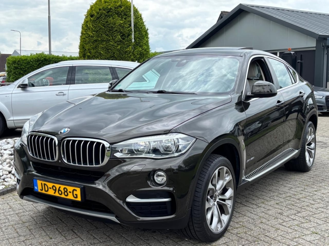 BMW X6 - 5.0i V8 High Executive 2014 Dealer Onderhouden - AutoWereld.nl