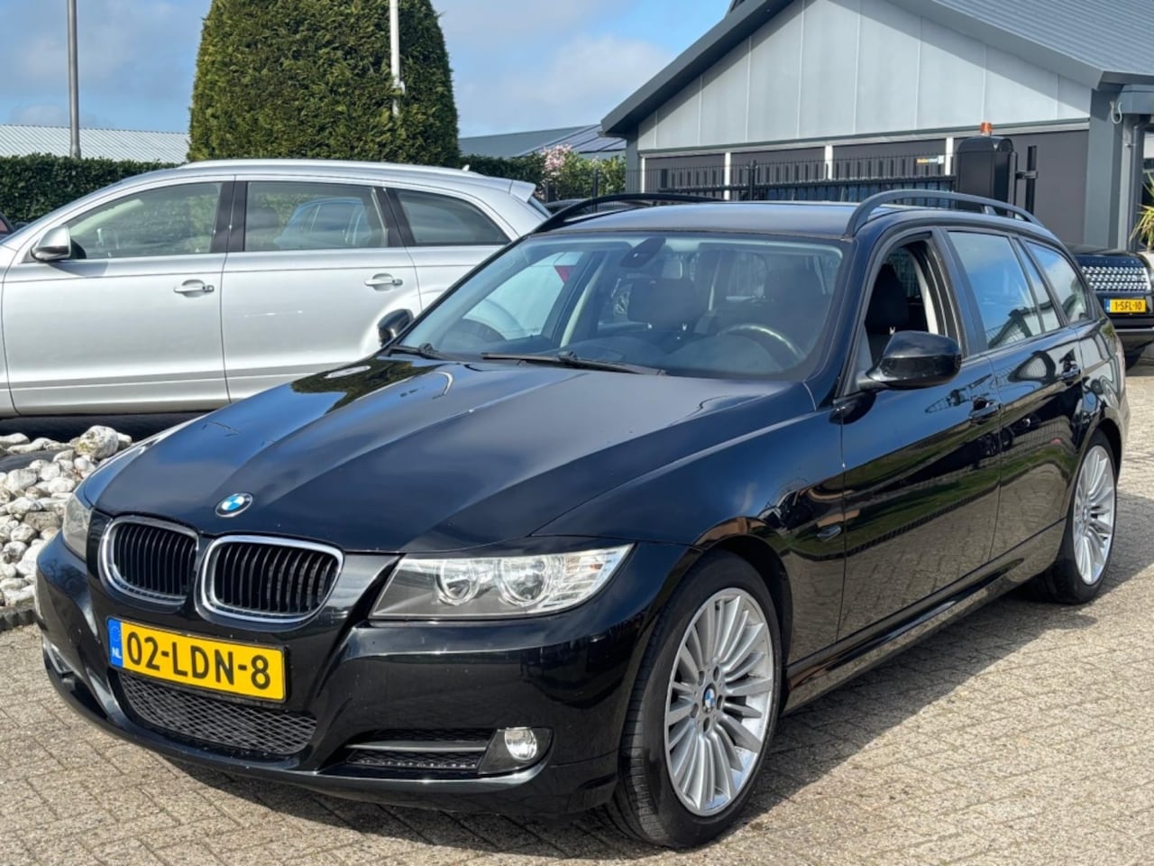 BMW 3-serie Touring - 318I Zwart 2010 Facelift NL Auto Sportvelgen Navi - AutoWereld.nl