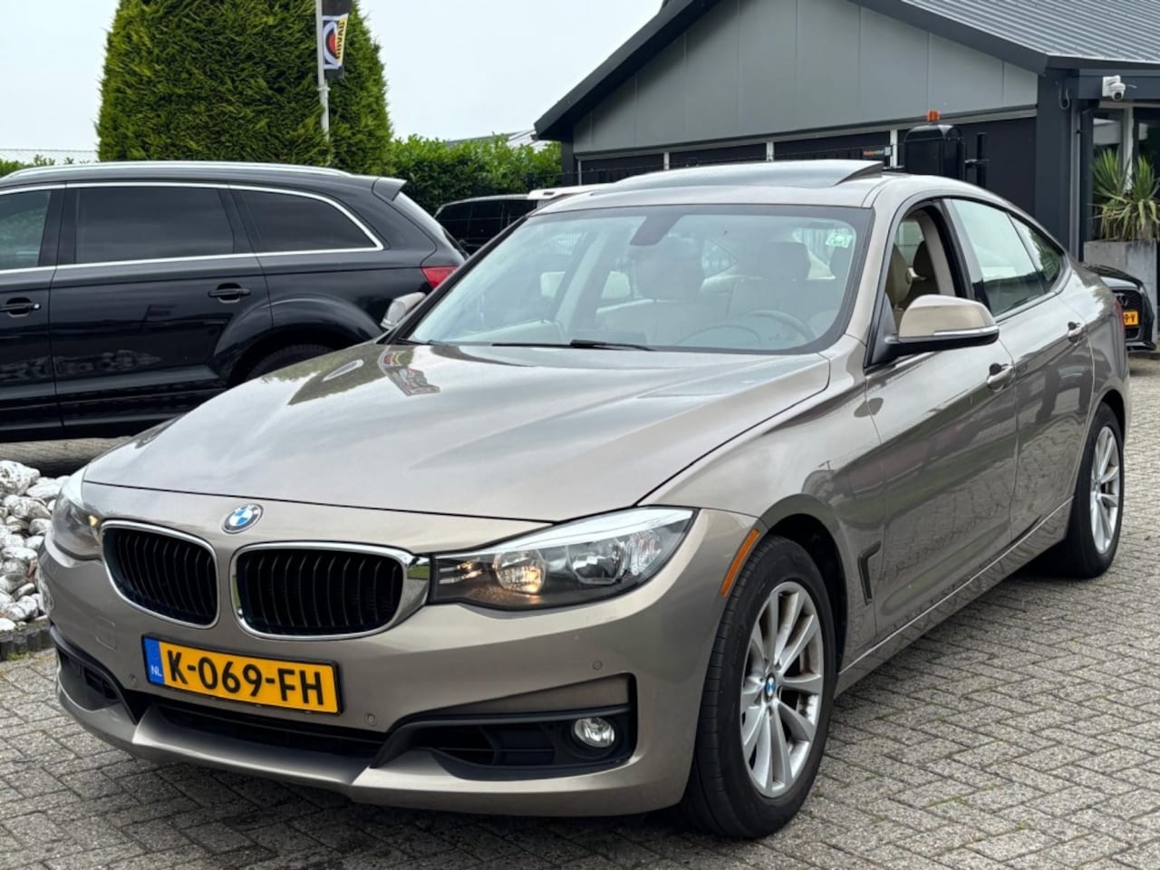 BMW 3-serie Gran Turismo - 328i X-Drive High Executive 2014 Panoramadak - AutoWereld.nl