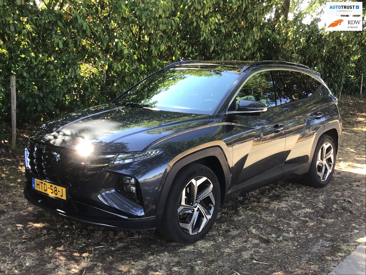 Hyundai Tucson - 1.6 T-GDI PHEV Premium Sky 4WD 1.6 T-GDI PHEV Premium Sky 4WD Nieuwstaat - AutoWereld.nl