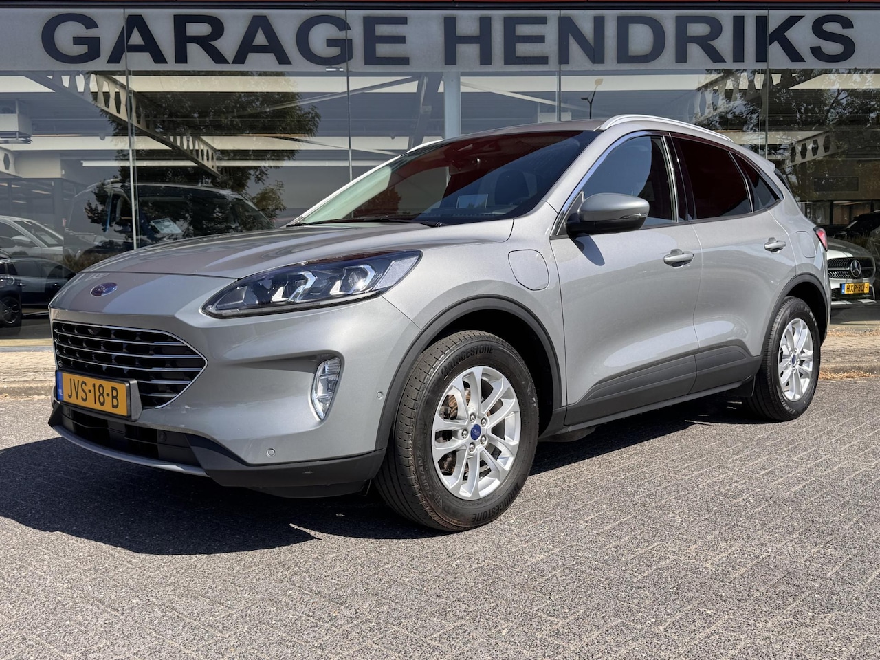 Ford Kuga - 2.5 PHEV Titanium | SOH: 92,5% | Winter Pack | B&O | Technology Pack | Leder-Stof | HUD | - AutoWereld.nl