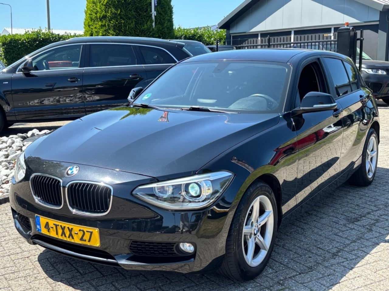 BMW 1-serie - 116i Exe Automaat 2014 Zwart 5-Deurs NL Auto - AutoWereld.nl