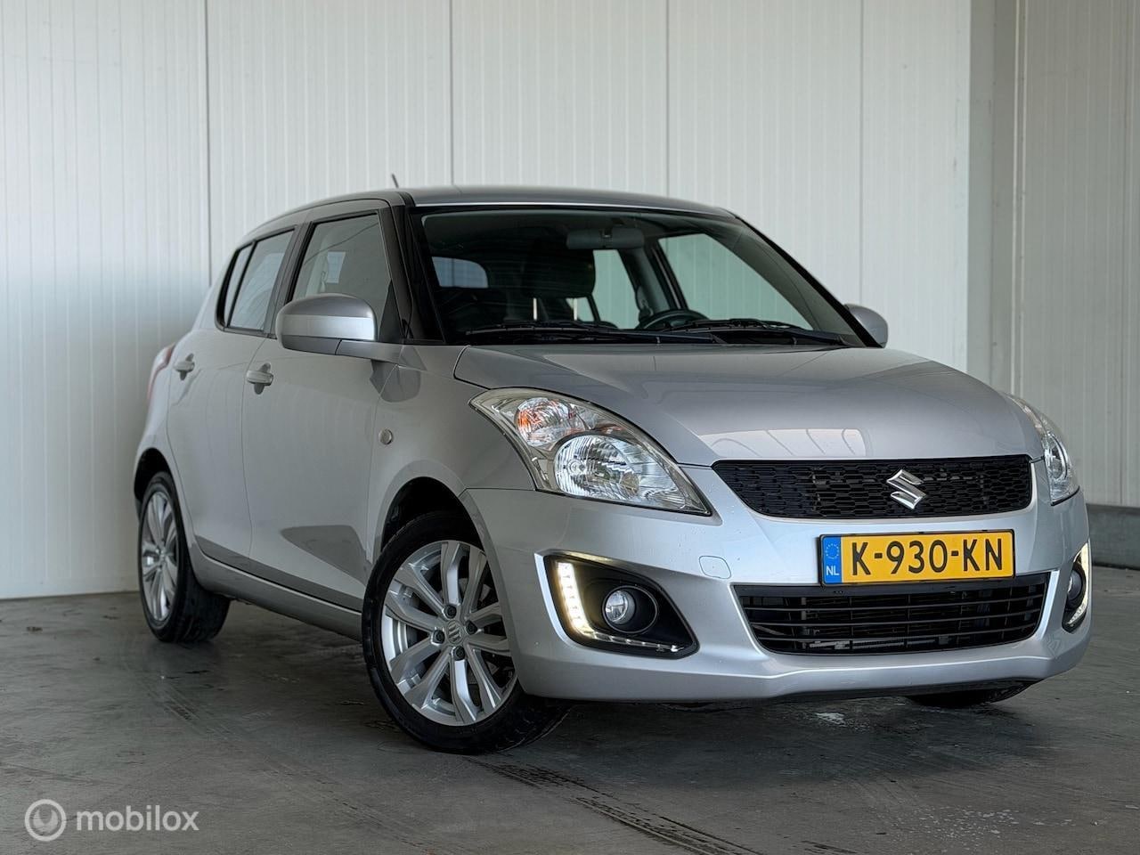 Suzuki Swift - 1.2 Exclusive Dealer OH - AutoWereld.nl