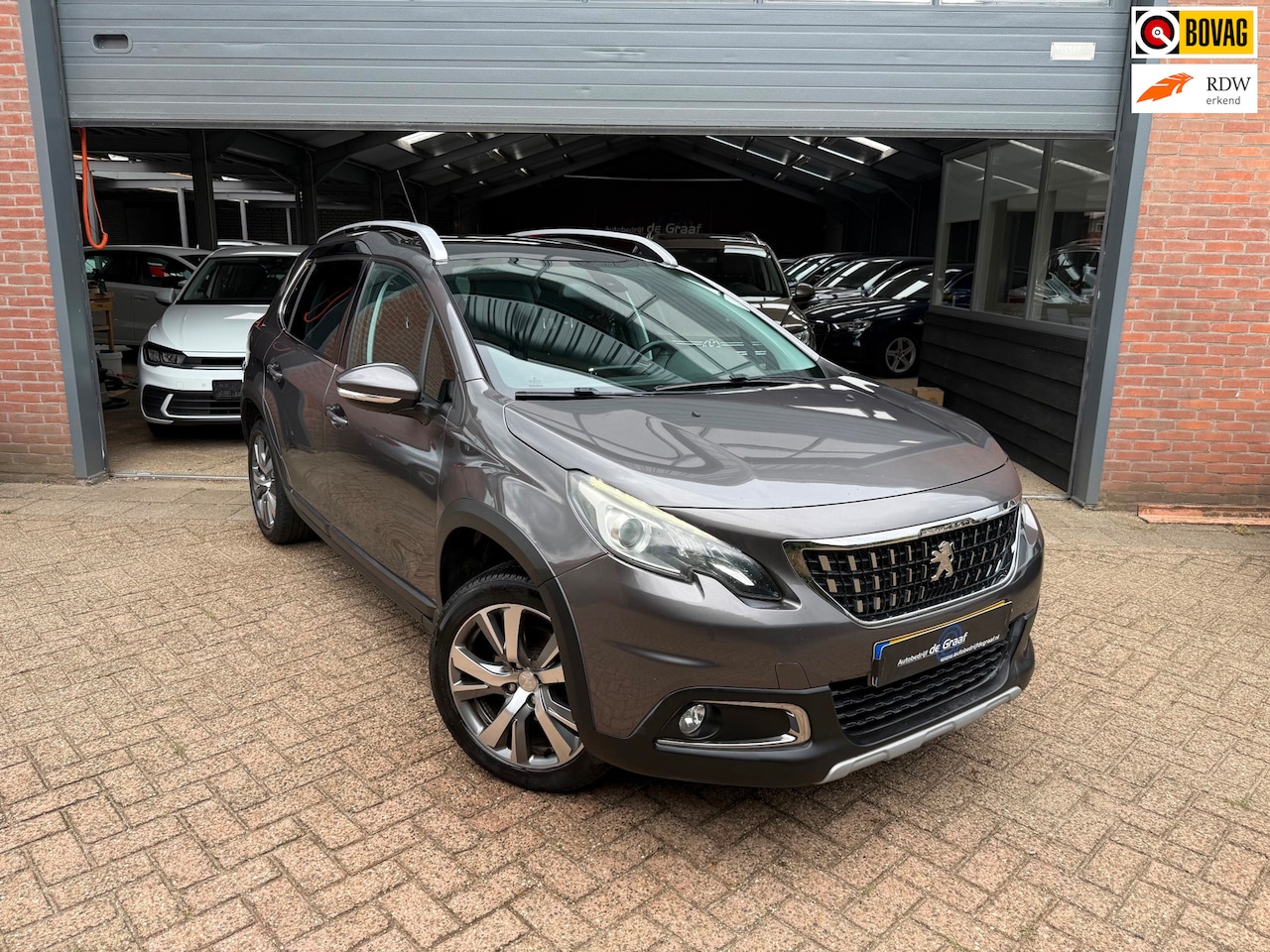 Peugeot 2008 - 1.2 PureTech Allure|PANO/TRHK/NW DBRIEM/CRUISE/PDC - AutoWereld.nl