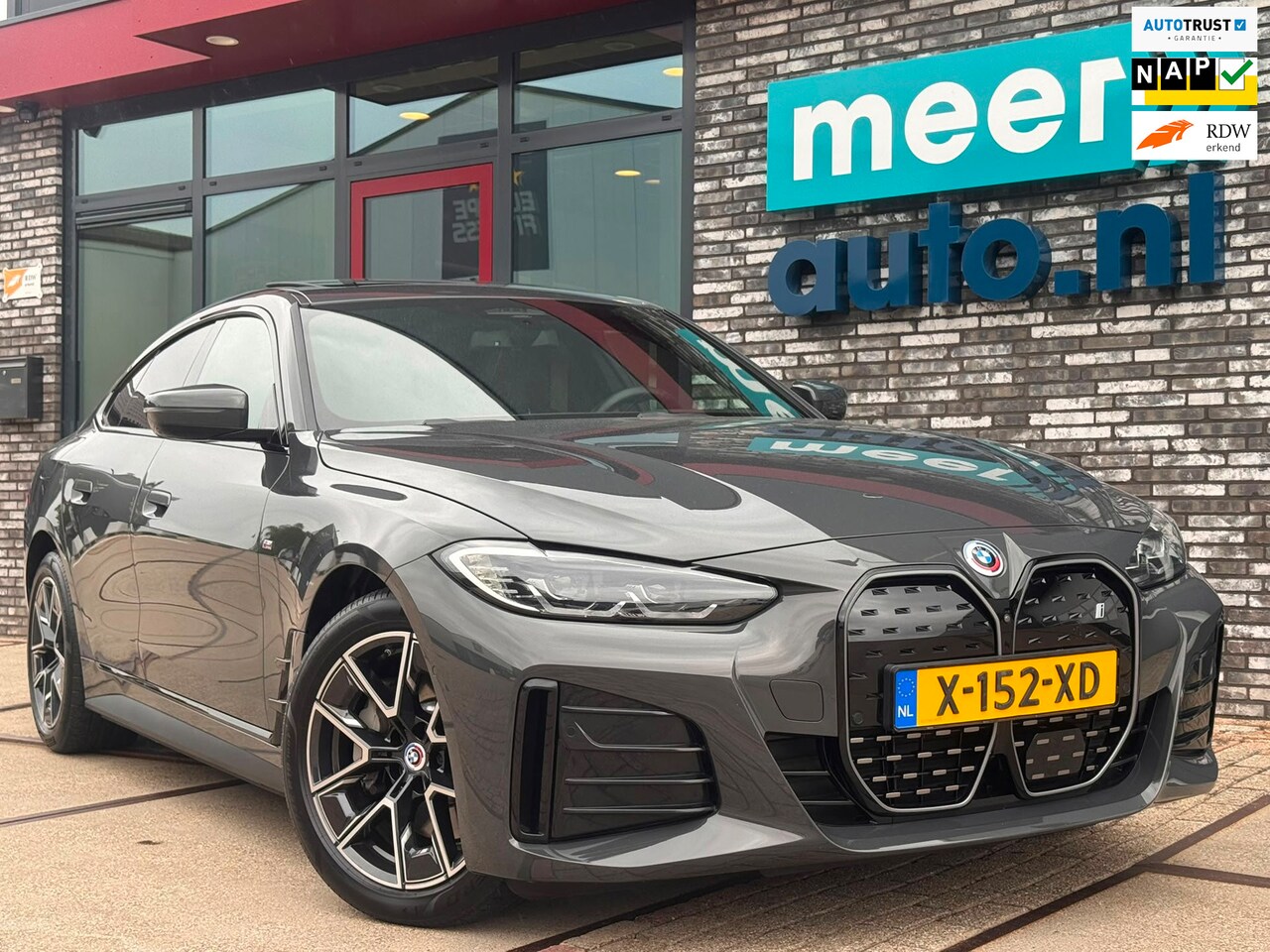 BMW i4 - 40 84 kWh High Executive M-SPORT l SOH 96,4% l H/K l HUD l 360 l SCHUIFDAK l DRAVITGRAU l - AutoWereld.nl