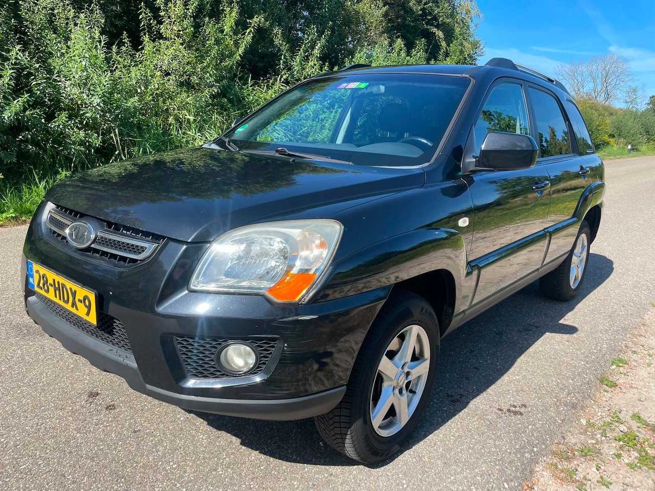 Kia Sportage - 2.0 CVVT X-ecutive 2.0 CVVT X-ecutive - AutoWereld.nl