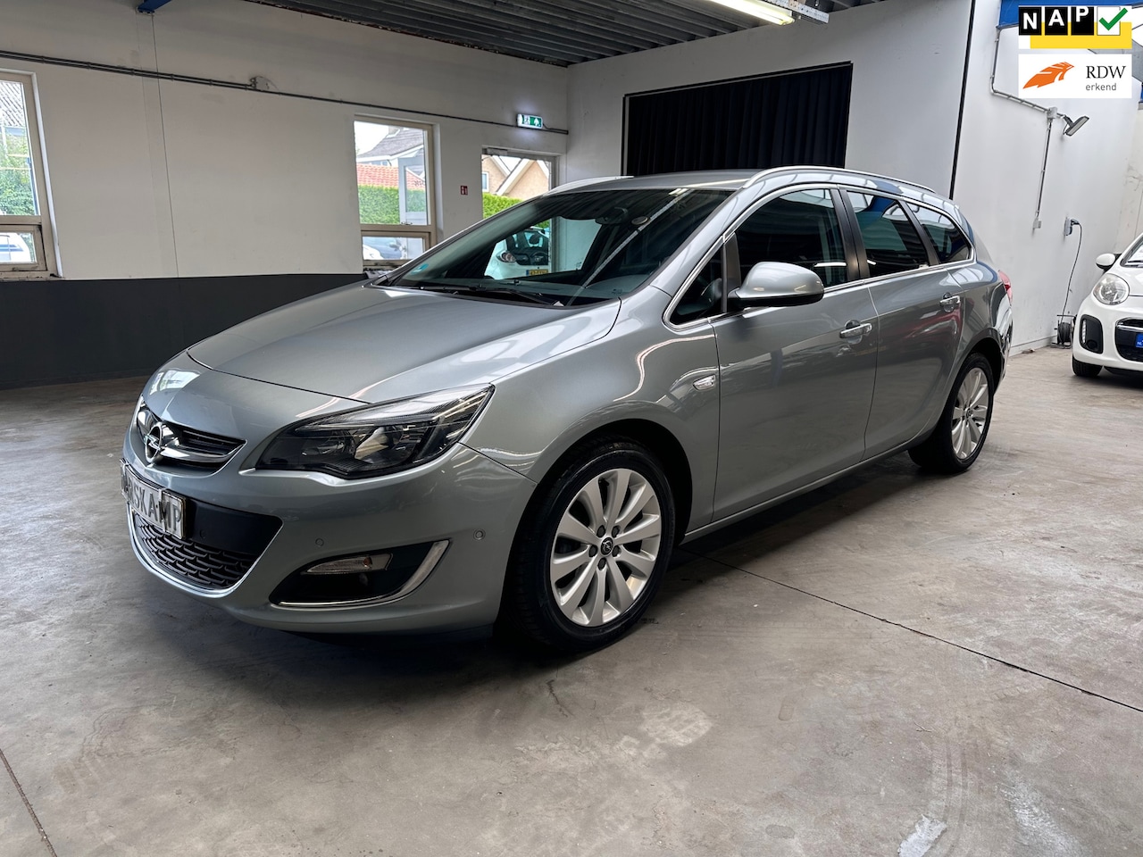 Opel Astra Sports Tourer - 1.4 Turbo Cosmo 1.4 Turbo Cosmo - AutoWereld.nl