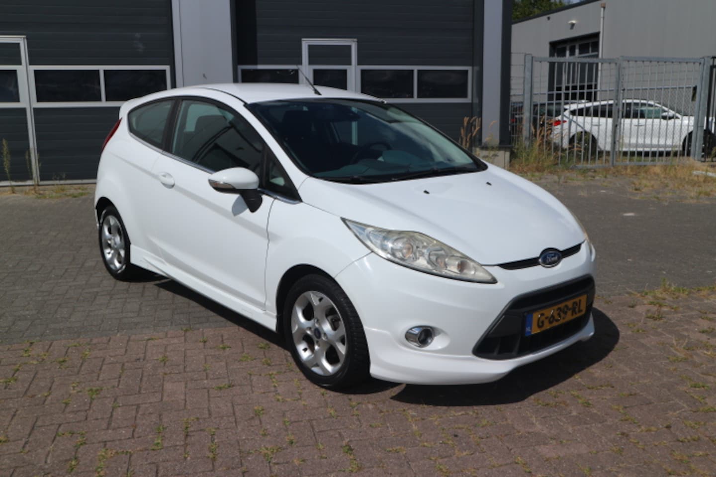 Ford Fiesta - 1.25 Ghia 1.25 Ghia - AutoWereld.nl