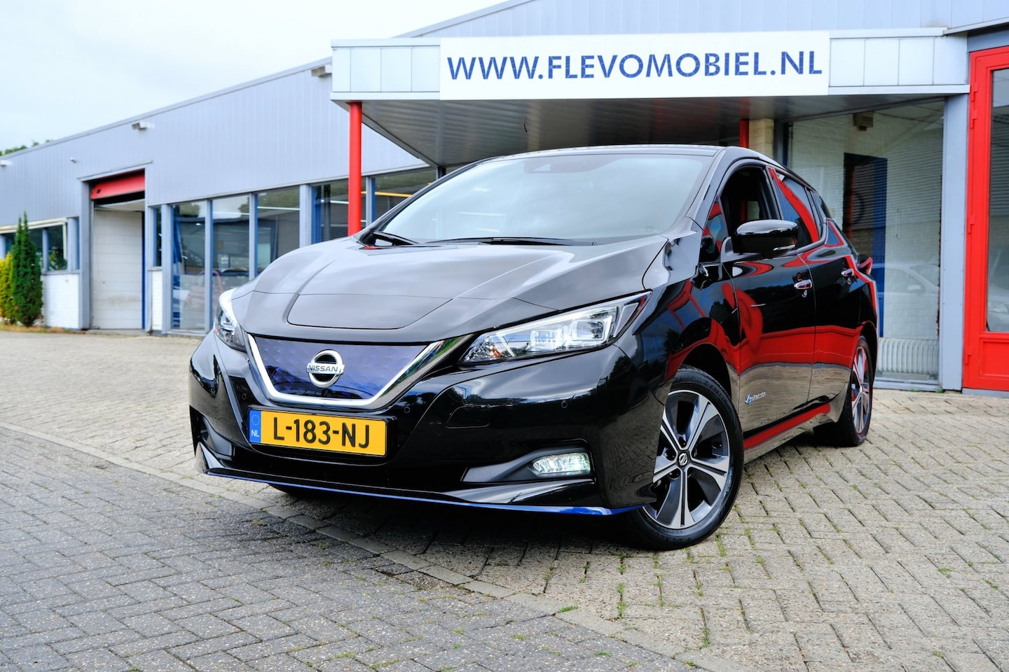 Nissan LEAF - E+ Tekna 62 kWh Long Range Aut. Leder|1e Eig|360Cam|Navi|Adapt.Cruise|LMV - AutoWereld.nl