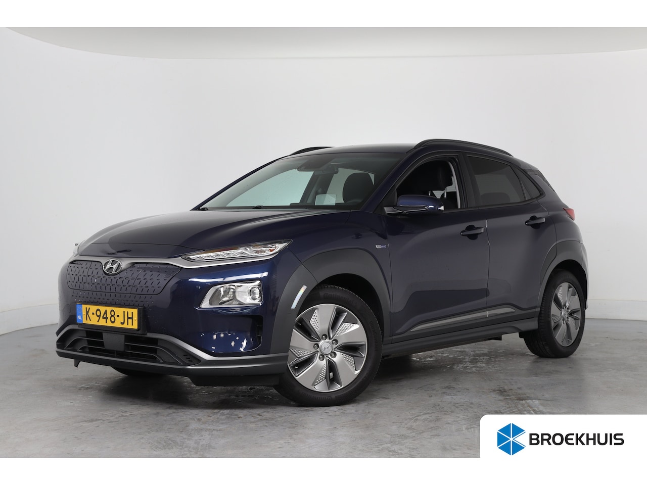 Hyundai Kona Electric - EV Fashion 64 kWh | SOH 100% | 1e Eigenaar! | Warmtepomp | Navi | HUD | Keyless | Navi | C - AutoWereld.nl