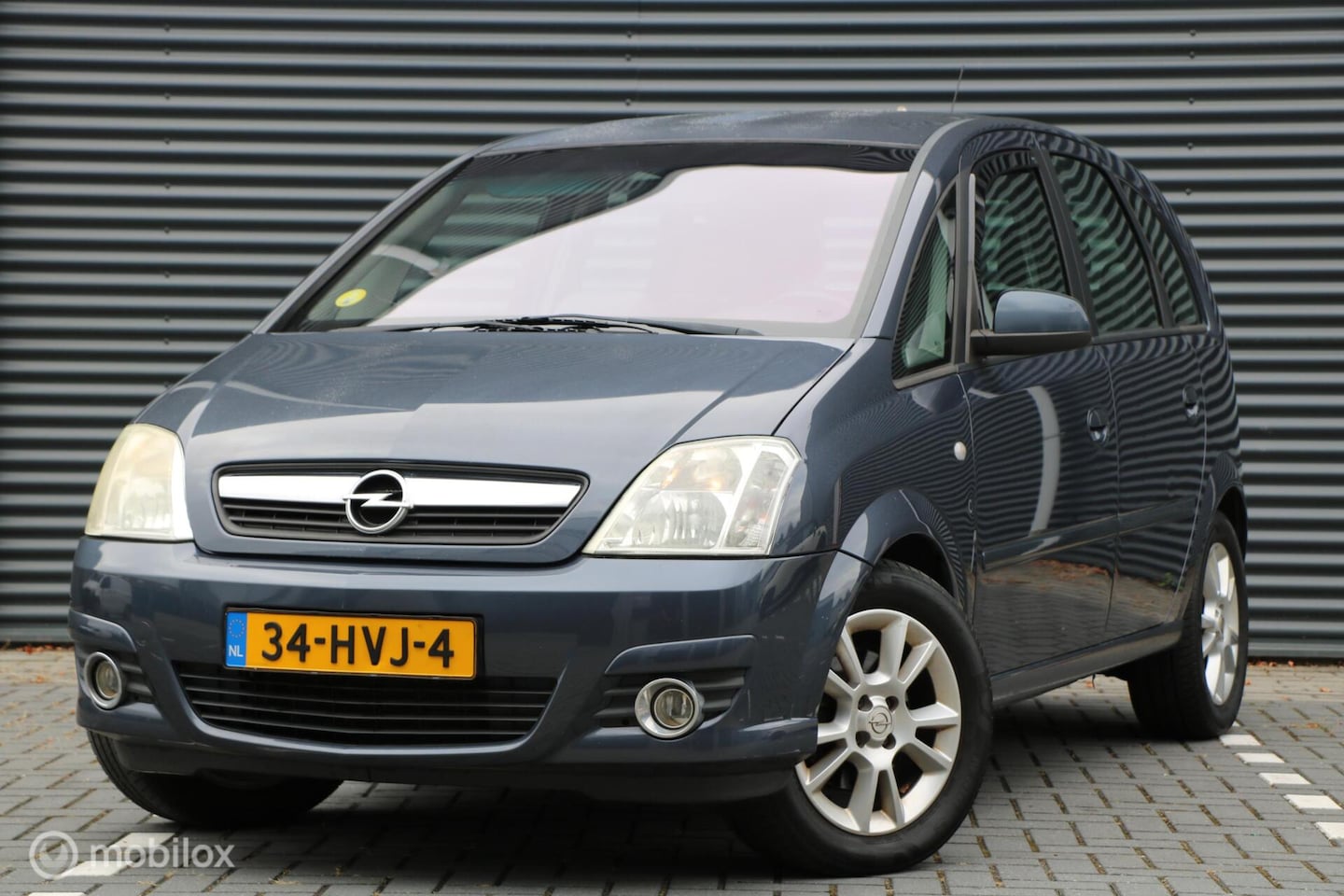 Opel Meriva - 1.6-16V Cosmo | Trekhaak | Climate | Navi - AutoWereld.nl
