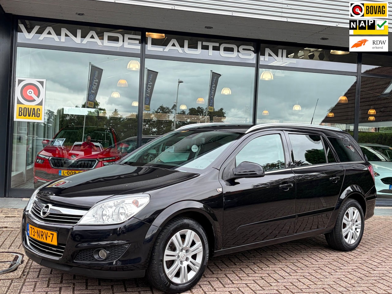 Opel Astra Wagon - 1.6 Cosmo Leer Navi Clima Cruise Trekhaak NL-Auto NAP Dealeronderhouden! - AutoWereld.nl