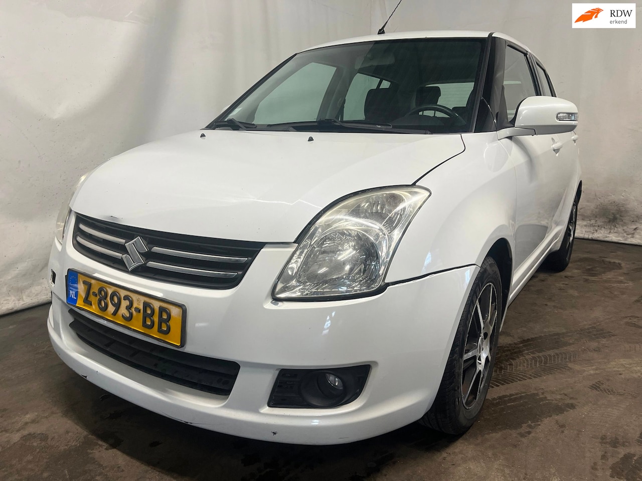 Suzuki Swift - 1.3 Cool - Front / Achter Schade - AutoWereld.nl