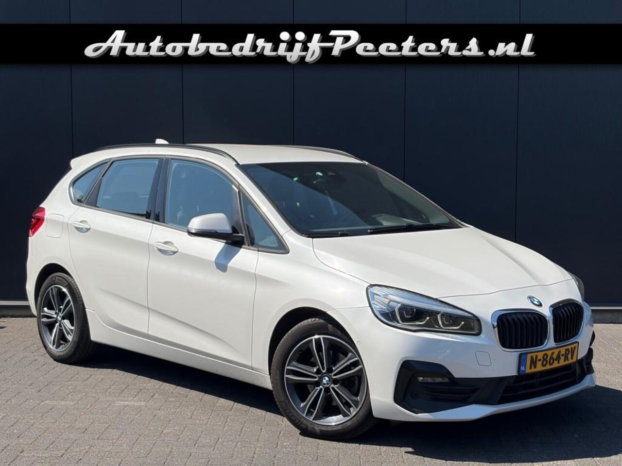 BMW 2-serie Active Tourer - 218i Automaat Leder LED Navi Cruise PDC e.Klep - AutoWereld.nl