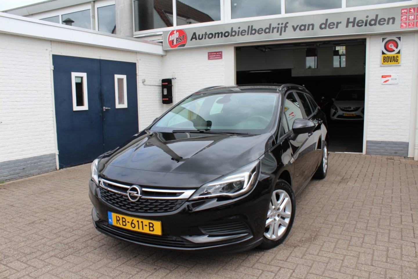 Opel Astra Sports Tourer - 1.0 Online Edition Navi - AutoWereld.nl