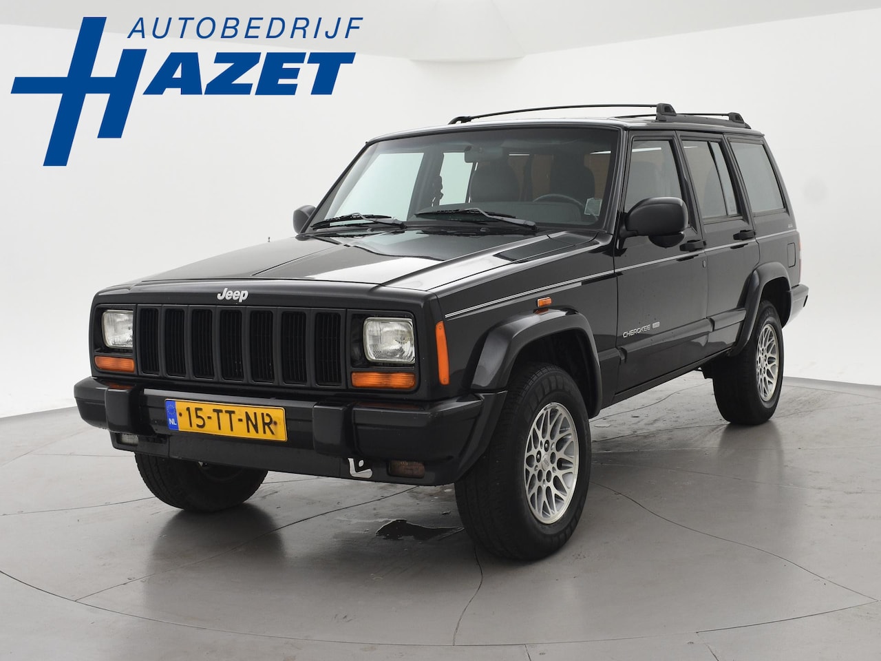 Jeep Cherokee - 4.0i LPG-G3 4X4 AUT. LIMITED + LEDER | 3250 KG TREKHAAK - AutoWereld.nl
