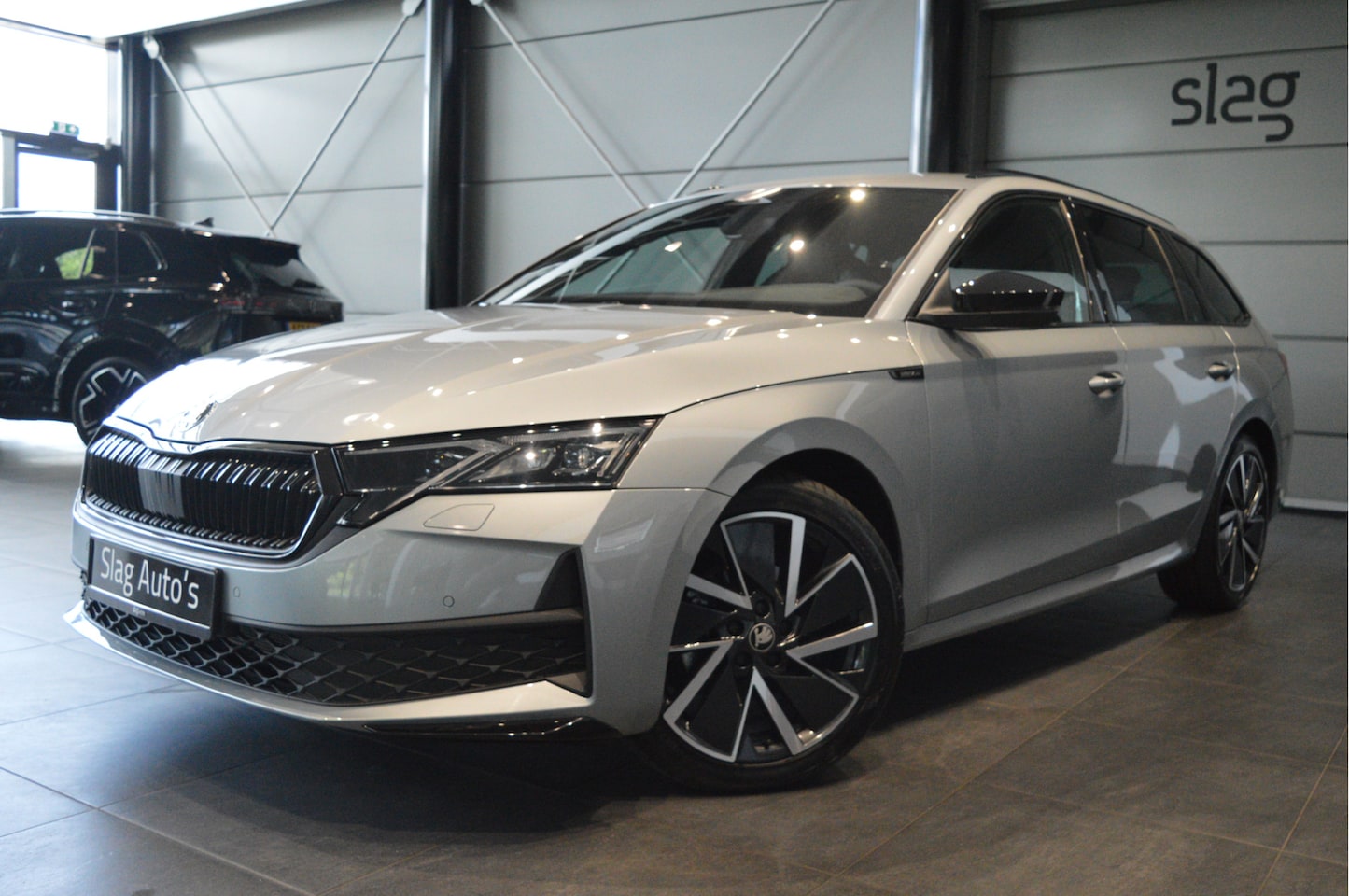 Skoda Octavia Combi - 1.5 TSI MHEV Sportline navi camera trekhaak 18 inch !! - AutoWereld.nl