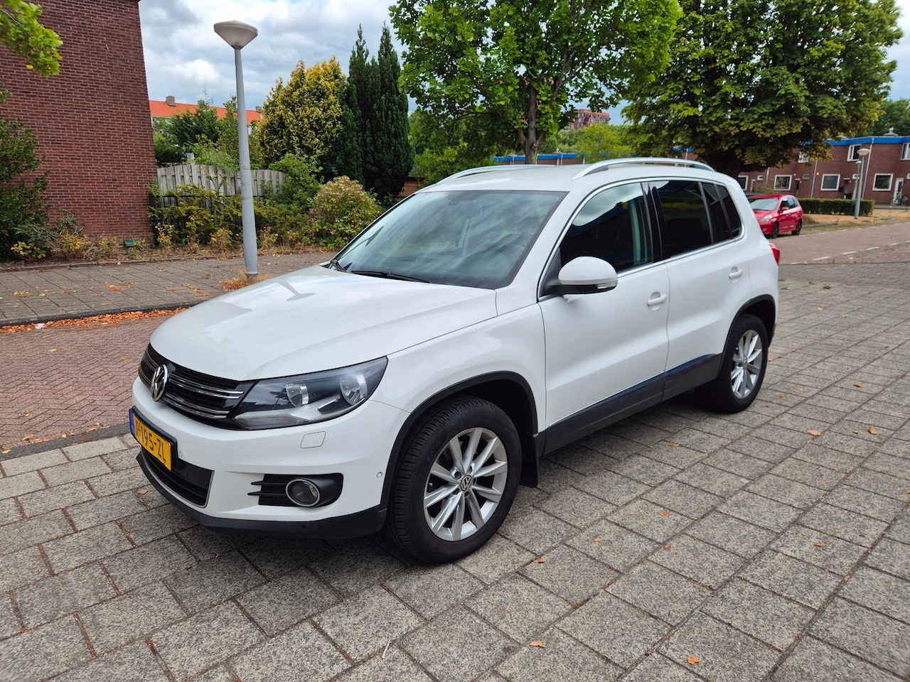 Volkswagen Tiguan - 1.4 TSI Sport&Style 4motion R-line Edition - AutoWereld.nl