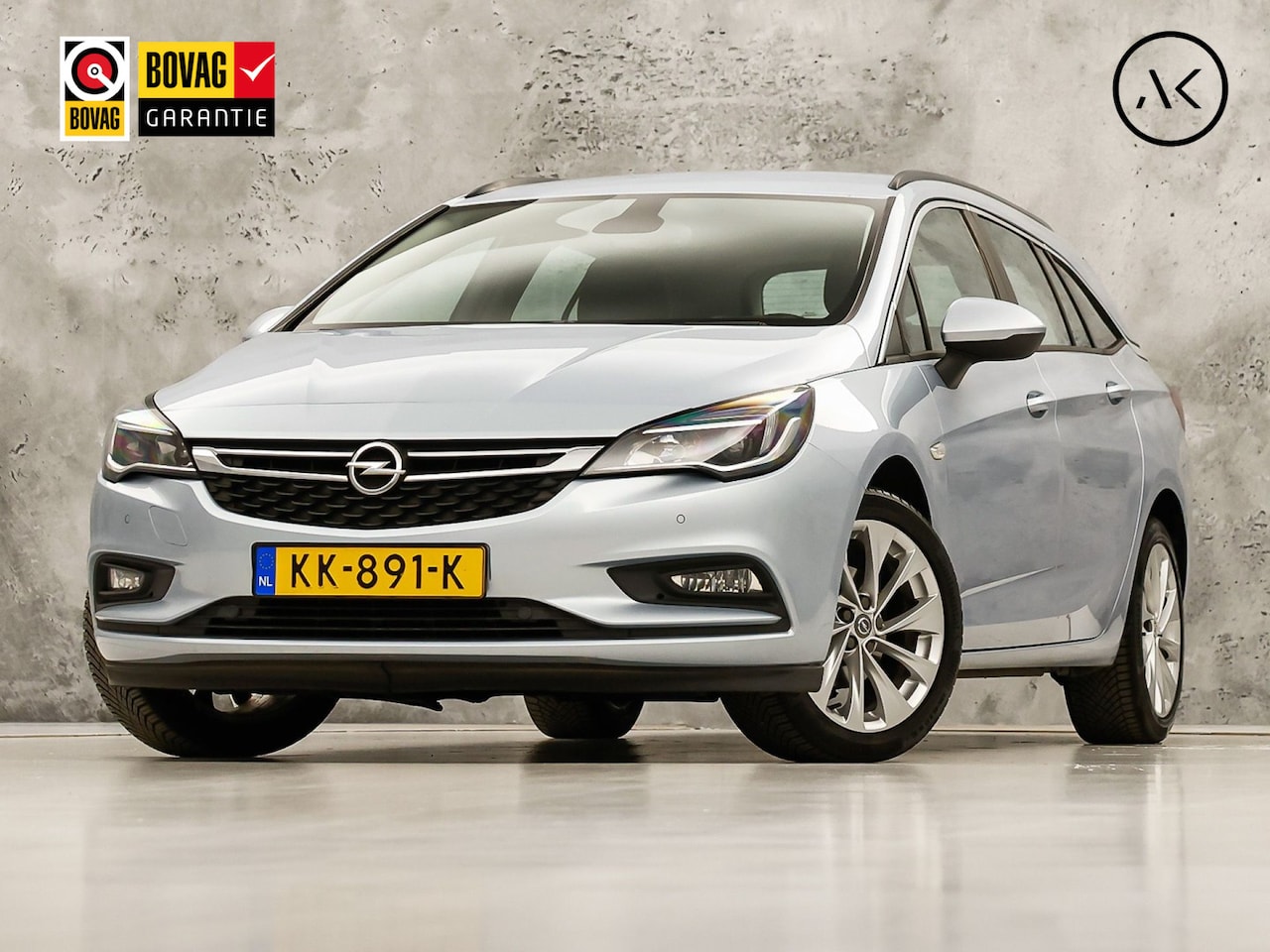 Opel Astra Sports Tourer - 1.0 Sport (APPLE CARPLAY, GROOT NAVI, CLIMATE, TREKHAAK, SPORTSTOELEN, CRUISE, PARKEERSENS - AutoWereld.nl