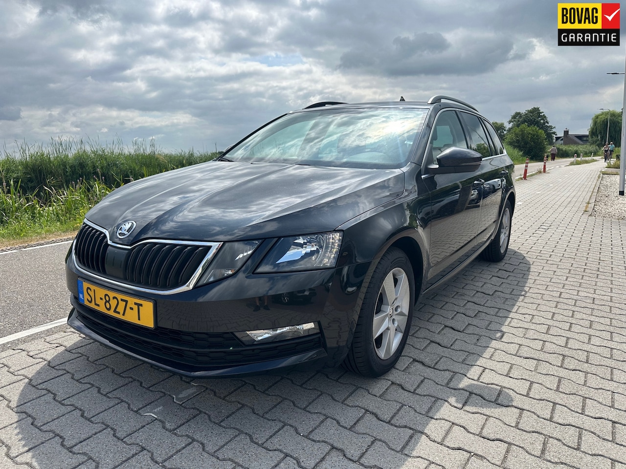 Skoda Octavia Combi - 1.4 TSI Greentech Ambition Business 1.4 TSI Greentech Ambition Business, Carplay, Cruisecontrol, Stoelverwarming, Half Leder - AutoWereld.nl