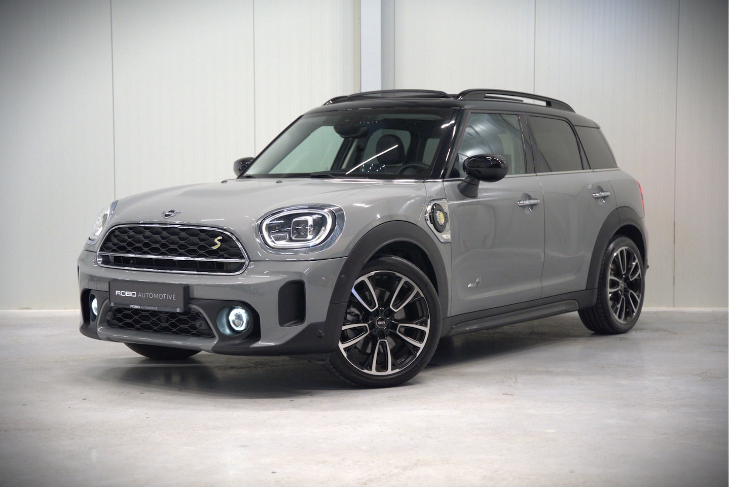MINI Countryman - 1.5 Cooper S E ALL4 Chili | Panoramadak | Stoelverwarming | Stuurverwarming | Head-Up Disp - AutoWereld.nl