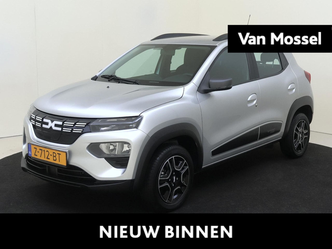Dacia Spring - Expression 27 kWh | Airco | lederen bekleding | metallic lak - AutoWereld.nl