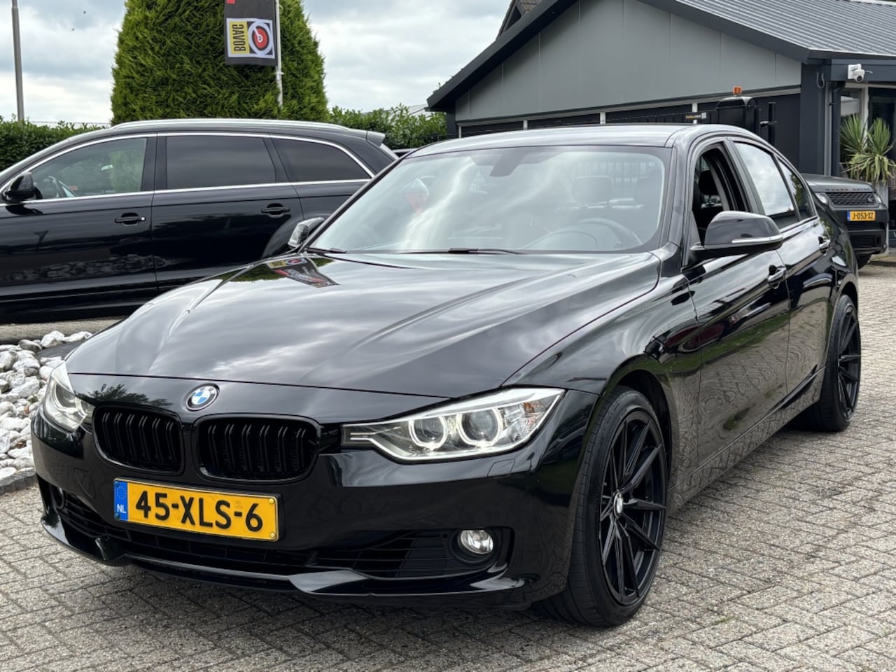BMW 3-serie - 320i High Executive Automaat 2012 Zwart Xenon - AutoWereld.nl