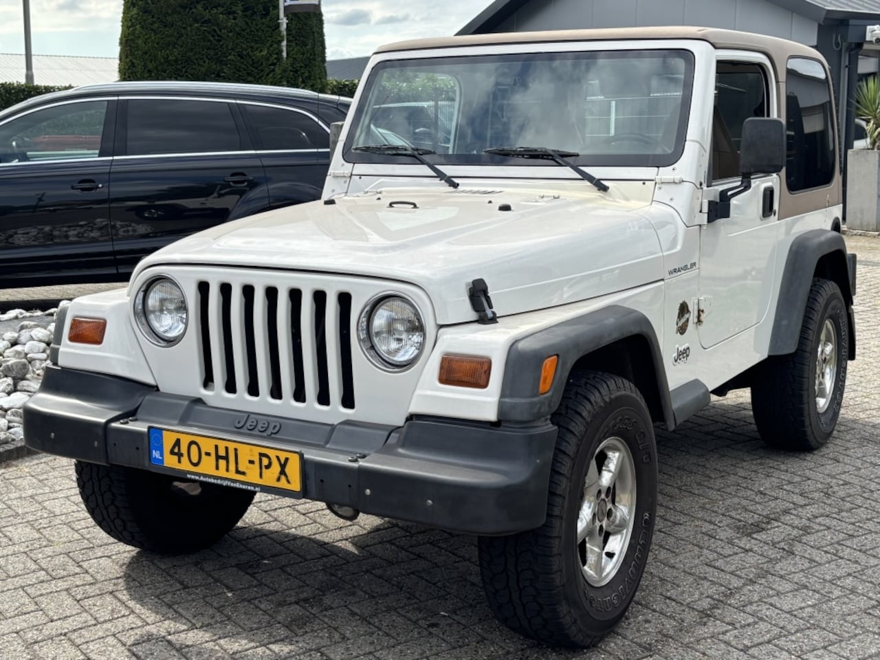 Jeep Wrangler - 2.5i Softtop Sahara Cabrio 1999 Benzine 4X4 - AutoWereld.nl