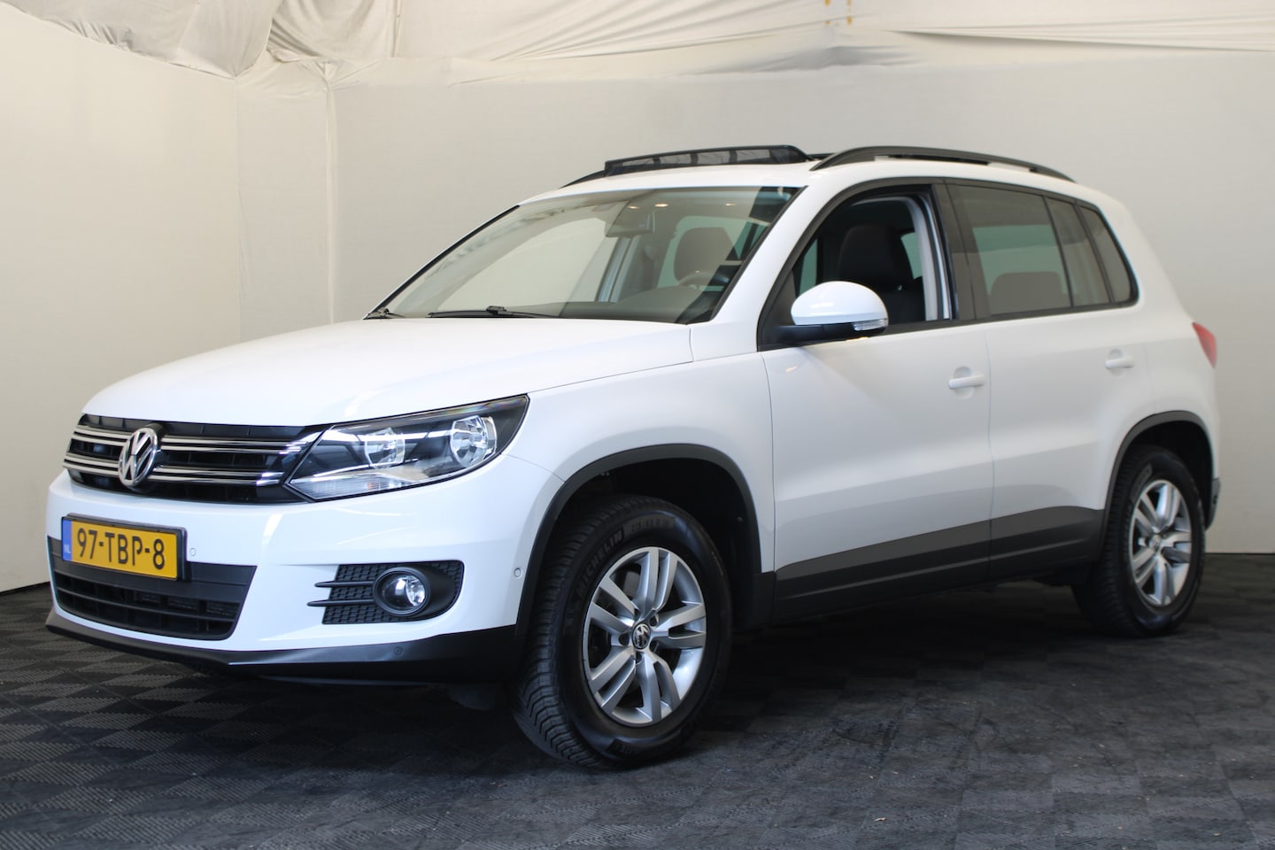 Volkswagen Tiguan - 1.4 TSI Comfort&Design Pano / navi /cruise - AutoWereld.nl