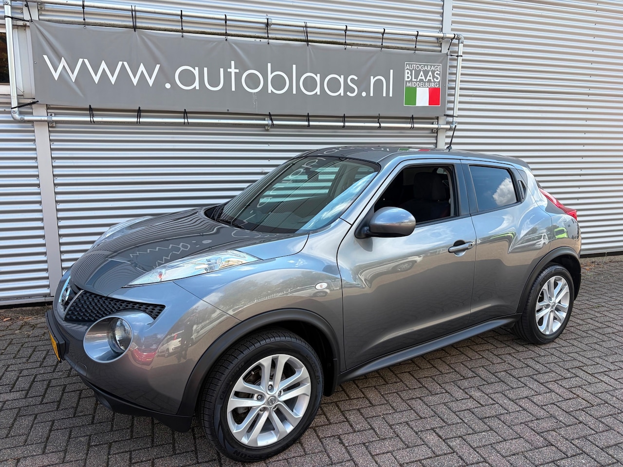Nissan Juke - 1.6 Acenta Automaat - AutoWereld.nl