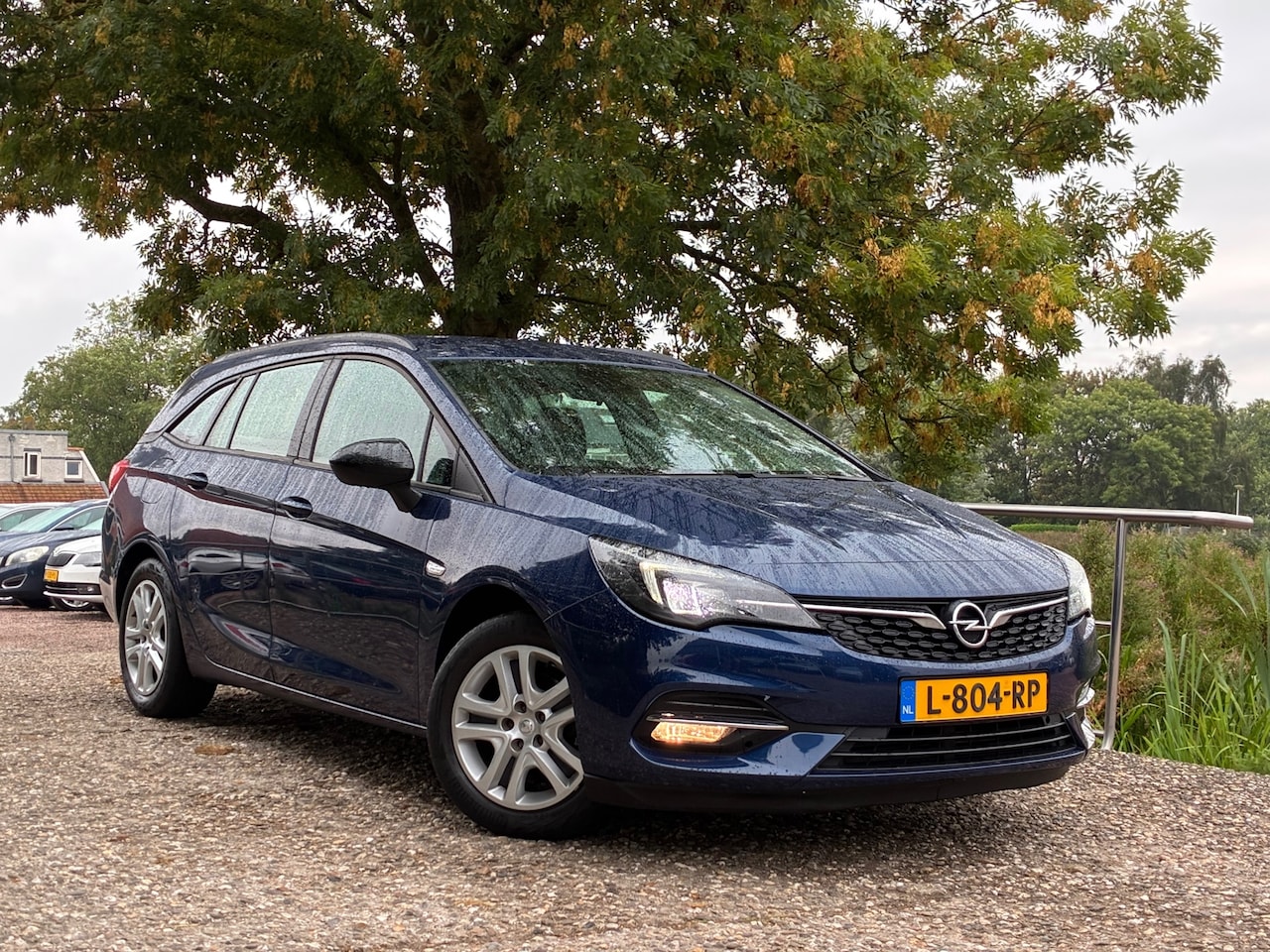 Opel Astra Sports Tourer - 1.2 Business Edition | Cruise + Clima + Navi Nu € 7.975,-!!! - AutoWereld.nl