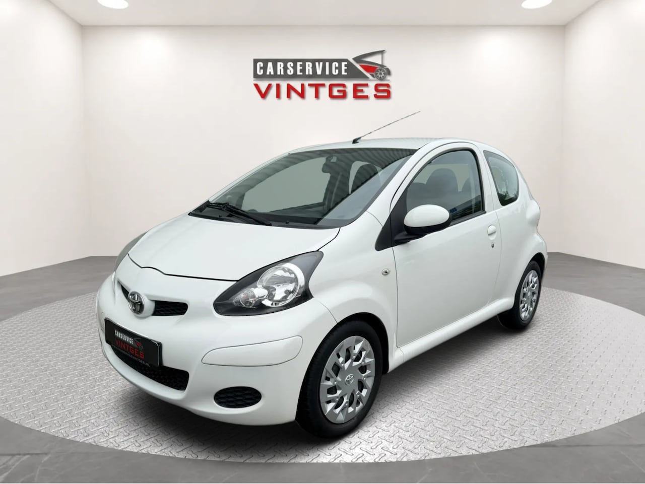 Toyota Aygo - 1.0-12V Comfort Automaat| 66.023 km NAP | Airco | Winter- en zomerset - AutoWereld.nl