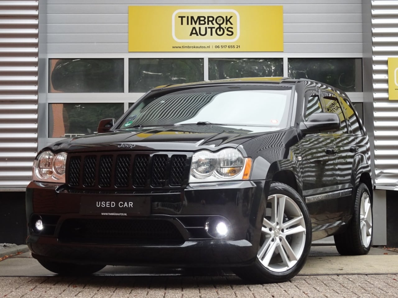 Jeep Grand Cherokee - 6.1 V8 Aut. SRT8 LPG *Schuifdak / Borla / 2 sets wielen* - AutoWereld.nl
