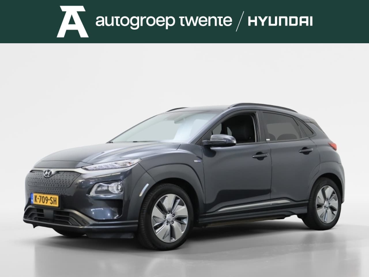 Hyundai Kona Electric - EV Premium 64 kWh | Afn. Fietsendragerhaak | Stoelverwarming | Navigatie | - AutoWereld.nl