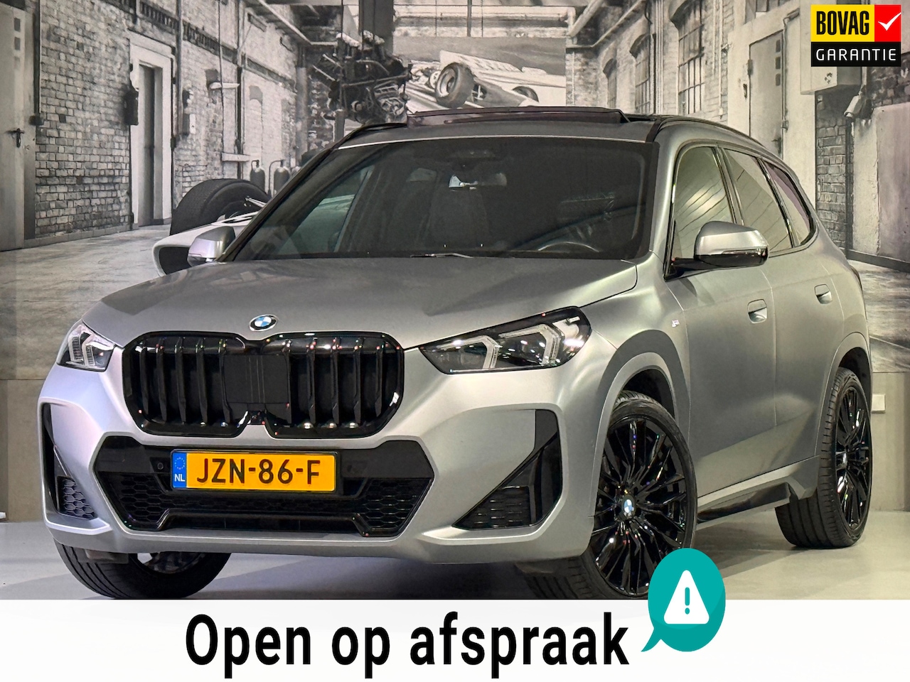 BMW X1 - SDrive18i M Sport Frozen Grey - AutoWereld.nl