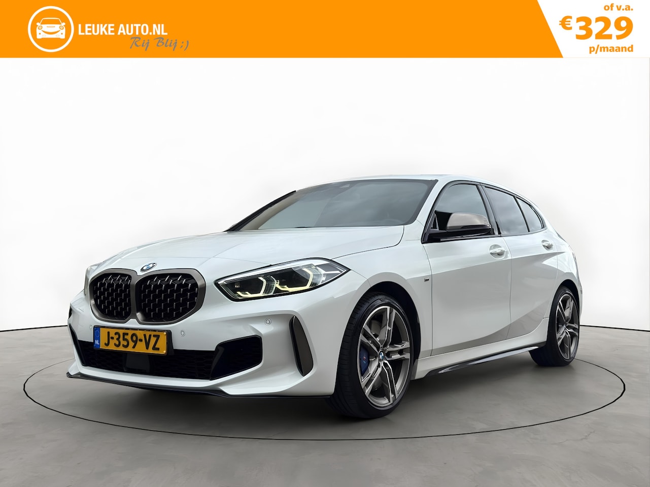 BMW 1-serie - M135I 306PK XDrive High Executive Schaalstoelen Head-UP - AutoWereld.nl