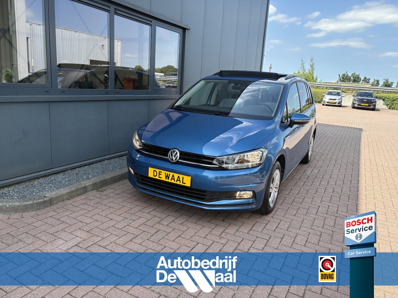 Volkswagen Touran - 1.5 TSi DSG Comfortline 7-pers. SCHUIFDAK/LEDER/CAMERA/NAVI/ADAPT.CRUISE/WINTERPACK - AutoWereld.nl