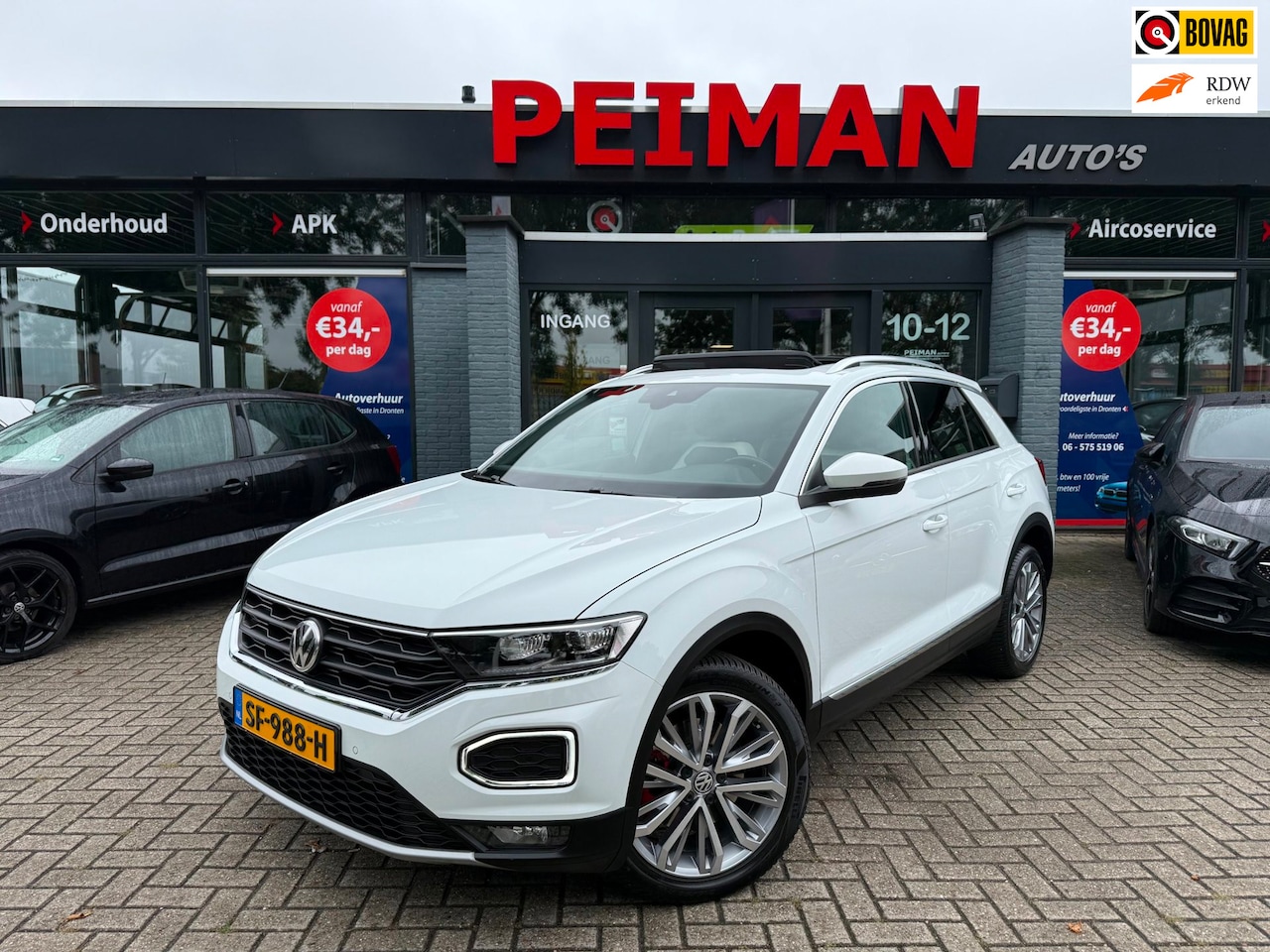 Volkswagen T-Roc - 1.5 TSI Sport | Apple Carplay | Panoramadak | Stoelverwarming | ACC | - AutoWereld.nl