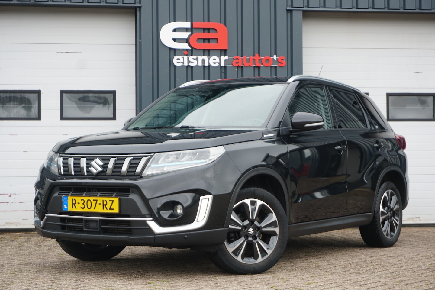 Suzuki Vitara - 1.4 Boosterjet Style Smart Hybrid | PANO.DAK | CAMERA | CARPLAY | STOELVERW. | TREKHAAK | - AutoWereld.nl
